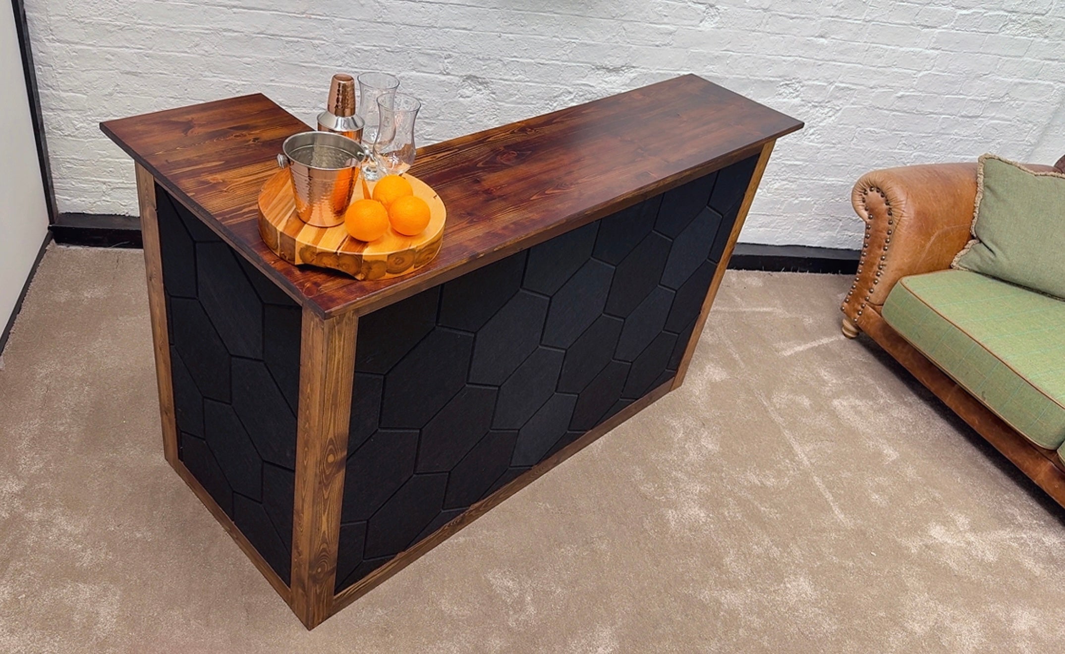 A wider lifestyle view showing how the bar can anchor a room.