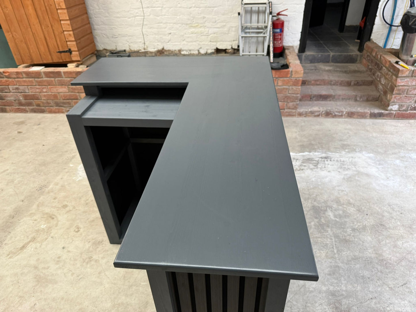 Modern L-Shaped Home Bar With Acoustic Panel Design